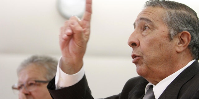 Lawrence Lucero, a former corrections officer at the Old Main, testifies with in favor of a bill to provide PTSD treatment for correctional officers from the 1980 prison riot at the House Judiciary Committee Thursday, Feb. 19, 2015, in Albuquerque, N.M. (AP Photo/The Santa Fe New Mexican, Luis Sanchez Saturno)