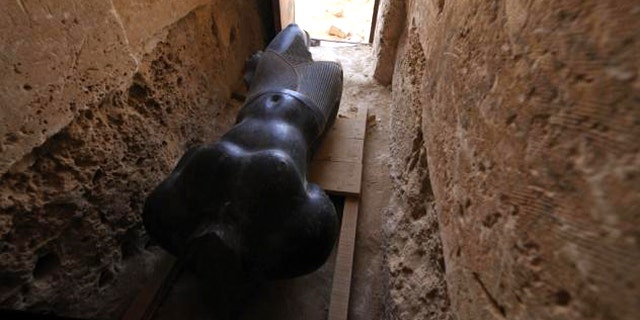 A large granite statue discovered at Taposiris Magna may represent an ancient king, Ptolemy IV.
