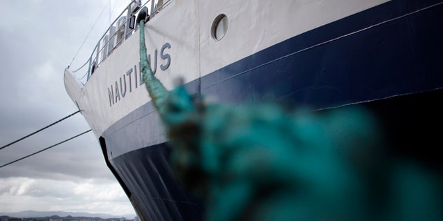 The exploration vessel, the Nautilus, sits at the port in San Juan, Puerto Rico, Thursday, Oct. 3, 2013. The man whose research team discovered the Titanic shipwreck is now leading a mission that will set out Friday on the Nautilus using a remotely operated vehicle, or ROV, to explore the Septentrional and other faults and underwater formations along Puerto Rico, the U.S. Virgin Islands and the eastern Caribbean islands of Dominica and Montserrat. (AP Photo/Ricardo Arduengo)