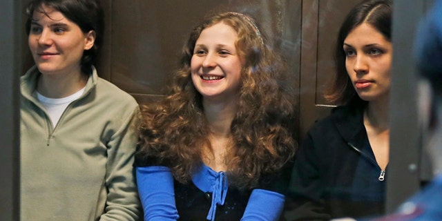 FILE 2012: Pussy Riot singer Maria Alekhina, center, was moved into a solitary cell following tension with other inmates.