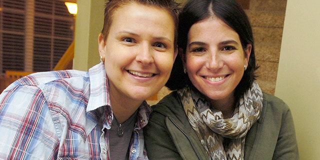 Feb. 5, 2015: In this 2011 file photo, Niki Quasney, left, poses for a photo with Amy Sandler, in Munster, Ind. Lambda Legal announced Sunday that Quasney of Munster died Thursday, Feb. 5, 2015. She was 38.