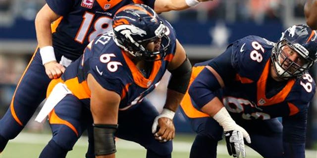 In this Oct. 6, 2013, photo, Denver Broncos quarterback Peyton Manning (18), center Manny Ramirez (66) and guard Zane Beadles (68) get ready for a play during an NFL football game against the Dallas Cowboys in Arlington, Texas. The man in the middle of Denver's offensive line, the one that's allowed the fewest sacks in the league, is the center who had never started a game at the position before this season. (AP Photo/Sharon Ellman)
