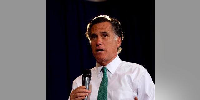 Republican presidential candidate, former Massachusetts Gov. Mitt Romney, speaks to a crowd during a campaign event, in Warwick, R.I., Wednesday, April 11, 2012. (AP Photo/Steven Senne)