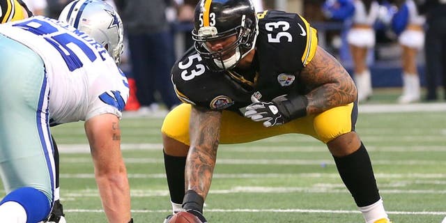 Dec 16, 2012; Arlington, TX, USA; Pittsburgh Steelers center Maurkice Pouncey (53) in action against the Dallas Cowboys at Cowboys Stadium. The Cowboys beat the Steelers 27-24 in overtime. Mandatory Credit: Matthew Emmons-USA TODAY Sports