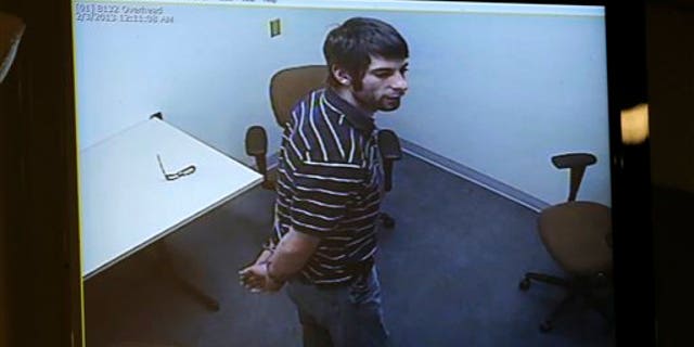 Prosecutors play the tape of the police interview with former Marine Cpl. Eddie Ray Routh at his capital murder trial at the Erath County, Donald R. Jones Justice Center in Stephenville, Texas, Monday, Feb. 16, 2015. Routh, 27, of Lancaster, is charged with the 2013 deaths of former Navy SEAL Chris Kyle and his friend Chad Littlefield at a shooting range near Glen Rose, Texas. (AP Photo/Star-Telegram, Rodger Mallison, Pool)