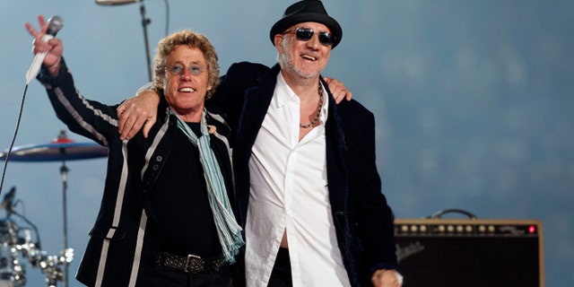 The Who guitarist Pete Townshend (r., with bandmate Roger Daltrey) says he downloaded child porn in a bid to follow the money trail. (AP)