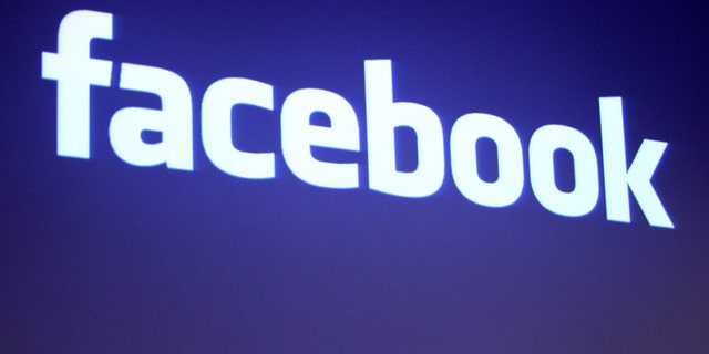 The Facebook logo is shown at Facebook headquarters in Palo Alto, California.