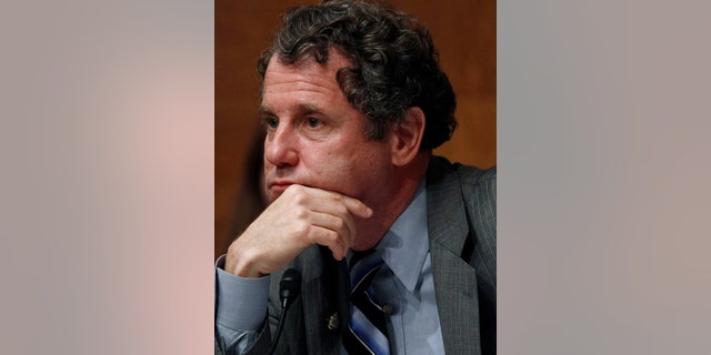 U.S. Senate Banking Subcommittee Chairman Sen. Sherrod Brown (D-OH) listens to a testimony during a hearing on banks and the financial crisis on Capitol Hill in Washington, June 15, 2011.