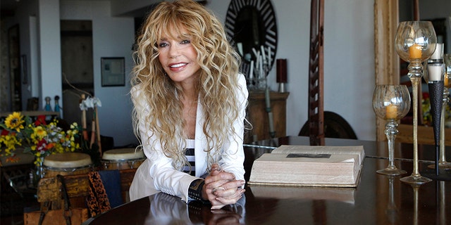 Actress Dyan Cannon poses for a portrait at her home in West Hollywood, California October 12, 2011. It was a fairy tale romance that turned in to a stormy marriage, and now Dyan Cannon has chronicled her relationship with Hollywood legend Cary Grant in her new book, "Dear Cary: My Life with Cary Grant." With an age difference of over 30 years, the duo had a magical courtship in the 1960s that eventually gave way to the dark side of Grant after they were engaged. Following three years of marriage and not long after the birth of their daughter Jennifer, the couple divorced and Cannon suffered a nervous breakdown.