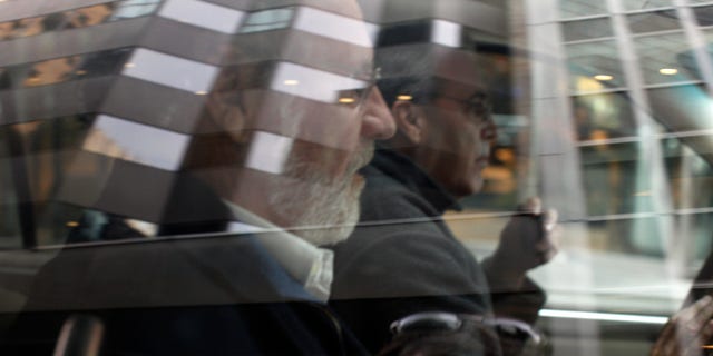 Jon Corzine, MF Global Holdings Ltd. CEO, leaves the office complex where MF Global Holdings Ltd have an office on 52nd Street in midtown Manhattan, October 31, 2011. MF Global Holdings Ltd filed for bankruptcy protection after a tentative deal with a buyer fell apart, marking a stunning failure for Corzine who tried to turn the more than 200-year-old futures brokerage into a mini-Goldman Sachs. REUTERS/Brendan McDermid (UNITED STATES - Tags: BUSINESS)