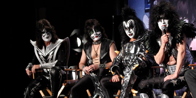 March 20, 2012: Rock band Kiss (from L-R) Tommy Thayer, Eric Singer, Gene Simmons and Paul Stanley attend a news conference to announce the "Kiss, Motley Crue: The Tour" in Hollywood, California.