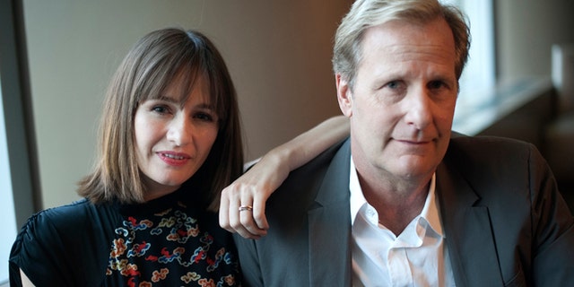 May 17, 2012: Cast members Emily Mortimer and Jeff Daniels (R) pose for a photo at the offices of HBO in New York.