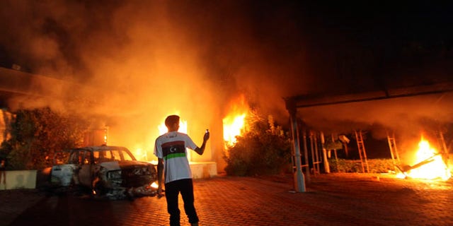 The U.S. Consulate in Benghazi is seen in flames on September 11, 2012.