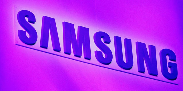 The company logo is displayed at the Samsung news conference at the Consumer Electronics Show (CES) in Las Vegas January 7, 2013.