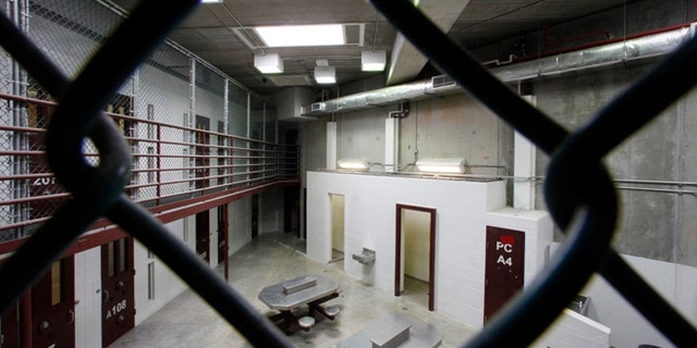 The interior of an unoccupied communal cellblock is seen at Camp VI, a prison used to house detainees at the U.S. Naval Base at Guantanamo Bay.