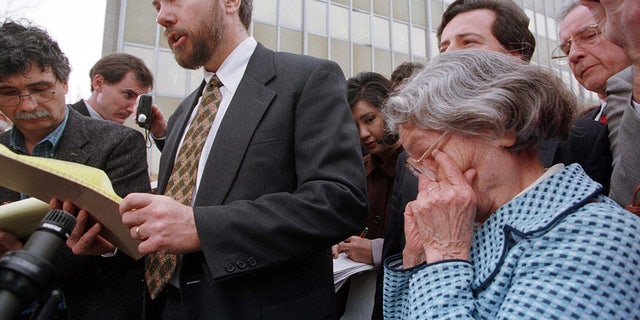 Wanda Kaczynski (R), mother of convicted Unabomber Ted Kaczynski, wipes tears from her eyes as Ted Kaczynski's brother David talks to the press outside the U.S. Courthouse in the Fred E. Moss Federal Building January 22. Ted Kaczynski pleaded guilty in court today to all charges filed against him.
KACZYNSKI - RTRAPCT