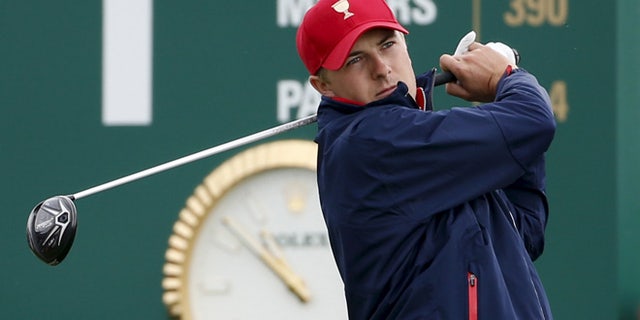 Oct. 11, 2015: U.S. team member Jordan Spieth tees off on the first hole during their singles matches of the 2015 Presidents Cup golf tournament.