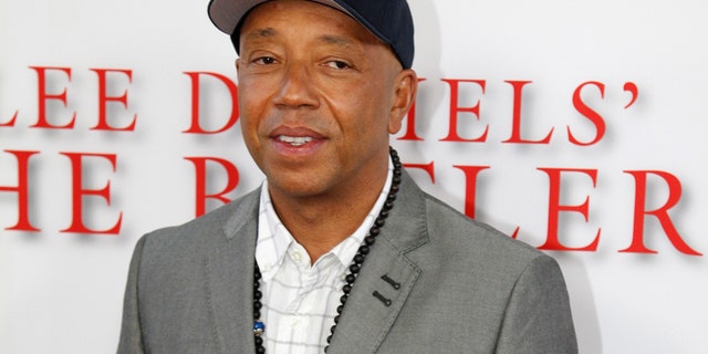 Russell Simmons arrives as a guest to the premiere of the new film "Lee Daniels' The Butler" in Los Angeles, California, on August 12, 2013.