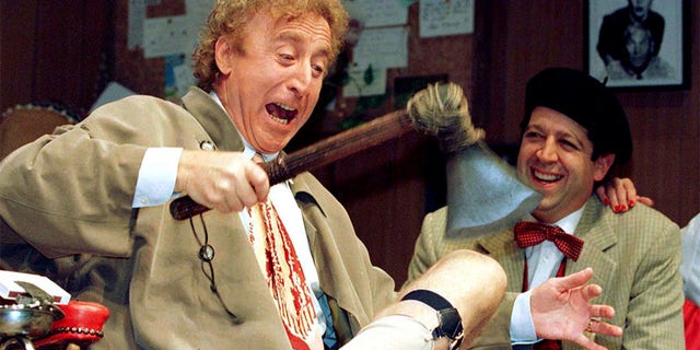 Gene Wilder (L) performs alongside compatriot Rolf Saxon, during the rehearsal of a scene from Neil Simon's "Laughter on the 23rd Floor" in New York, October 2, 1996.