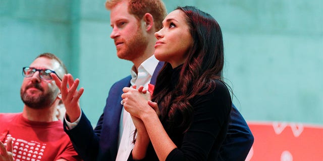 Meghan Markle with Prince Harry after their engagement announcement.