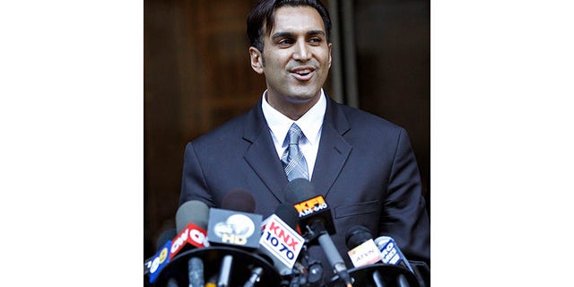 Defendant doctor Sandeep Kapoor talks to the media outside the Los Angeles County Criminal Courts building in Los Angeles October 28, 2010. A jury acquitted Kapoor of all charges that he illegally supplied Anna Nicole Smith with prescription drugs for years before her death from an accidental overdose.