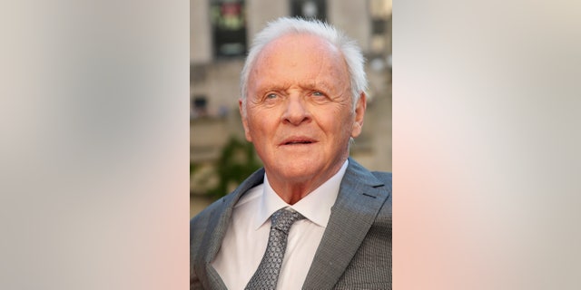 Anthony Hopkins' Malibu home is still standing after the California wildfires destroyed his neighbor's home.
