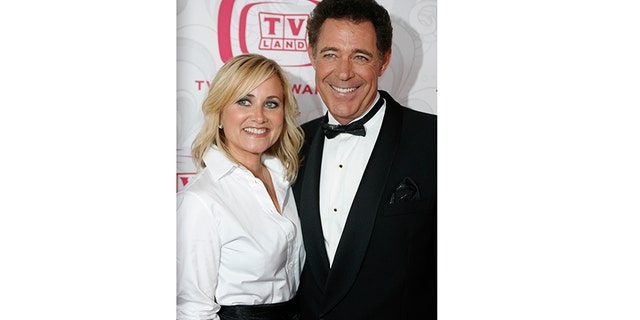 Cast members of the television series 'The Brady Bunch' Maureen McCormick, left, and Barry Williams pose together as they arrive for the taping of the 5th Annual TV Land Awards in Santa Monica, California April 14, 2007.