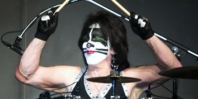 Kiss drummer Peter Criss performs during a sold-out show at the Rain in the Desert nightclub inside the Palms Resort Casino in Las Vegas, Nevada, March 16, 2003.