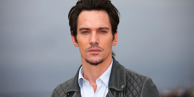 Actor Jonathan Rhys Meyers poses during a photocall at the MIPTV, the International Television Programs Market, in Cannes, France, April 4, 2016. REUTERS/Eric Gaillard - D1AESWMBMJAA
