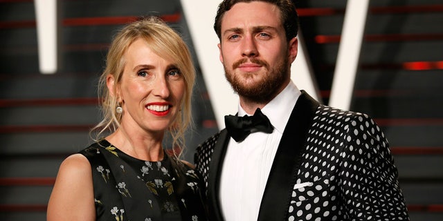Director Sam Taylor-Johnson and husband, Aaron Taylor-Johnson, arrive at the Vanity Fair Oscar Party in Beverly Hills, California February 28, 2016.