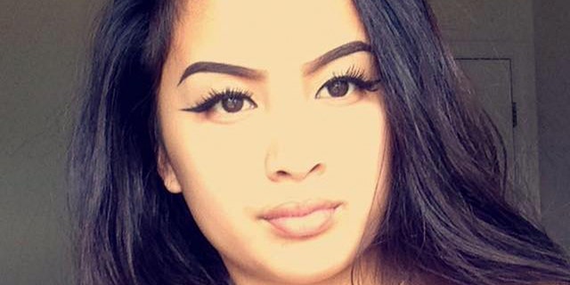 Raelyn Domingo was arrested in connection with a shooting and robbery.
