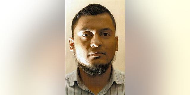 This undated photo released by the British Metropolitan Police shows Rajib Karim who was found guilty Monday Feb. 28, 2011 at Woolwich Crown Court in London of plotting to blow up a plane while working as a computer specialist with British Airways.