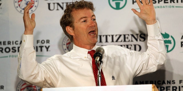 Sen. Rand Paul, R-Ky. speaks at a GOP Freedom Summit, Saturday, April 12, 2014, in Manchester, N.H. Several potential Republican White House contenders _ among them Kentucky Sen. Rand Paul, Sen. Ted Cruz, and former Arkansas Gov. Mike Huckabee _ headline a conference Saturday in New Hampshire, hosted by the conservative groups Citizens United and Americans for Prosperity. (AP Photo/Jim Cole)