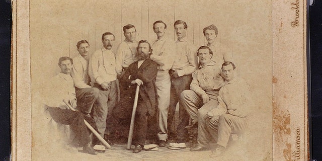 Jan 9, 2013: This photo released by the Saco River Auction Co., in Biddeford, Maine, shows a rare 1865 baseball card of the Brooklyn Atlantics, discovered in a photo album bought at a yard sale in Baileyville, Maine, on the Canadian border