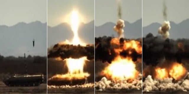 The 2007 field test of an Excalibur round, a GPS-guided munition that allows warfighters to hit targets out of sight and miles away. The PERM is a similar, new round from Raytheon.