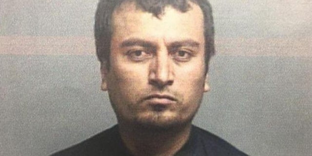 This booking photo released Tuesday, July 28, 2015, by the Lake County Sheriff’s Department shows Juan Emmanuel Razo, 35, arrested after a shootout with deputies in Painesville Township, Ohio.