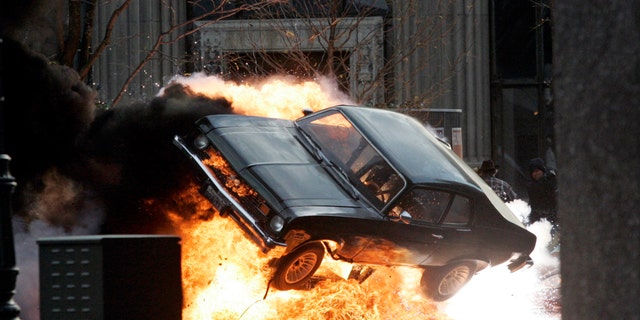 A car blows up on the set of "Red Dawn" in Detroit, Michigan, October 19, 2009. (REUTERS/Rebecca Cook)