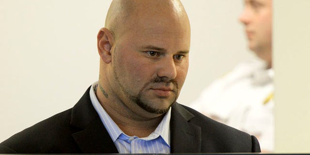 Oct. 8: Jared Remy, son of Boston Red Sox broadcaster Jerry Remy, stands during arraignment at Middlesex Superior Court in Woburn, Mass.