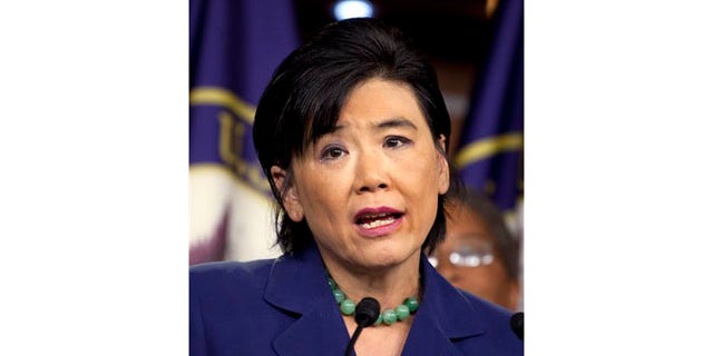 FILE: Rep. Judy Chu, D-Calif., speaks at a news conference on Capitol Hill in Washington. At a House Armed Services hearing on military suicides Friday, Sept. 9, 2011, Chu testified, and in a dramatic moment described the death of her nephew, Marine Lance Cpl. Harry Lew, 21, who put a gun to his head and killed himself while in a foxhole in Afghanistan after fellow Marines allegedly hazed him one night.