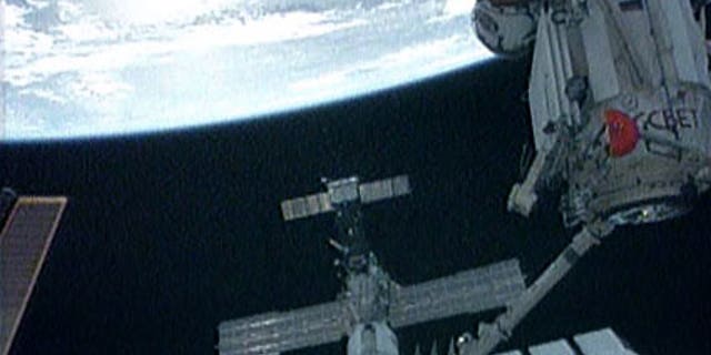 May 18: The International Space Station's robotic arm moves the Russian Mini-Research Module-1, named Rassvet, to its new position on the Russian segment of the station.