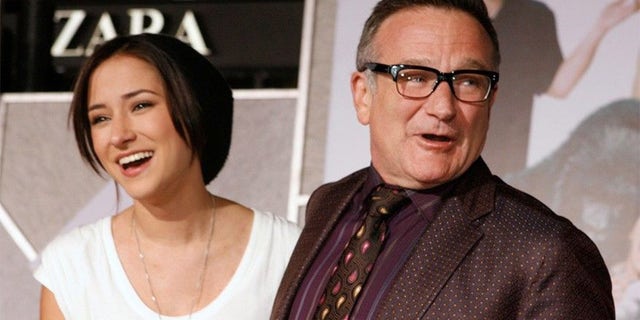 Zelda Williams (left) and her late father Robin Williams.