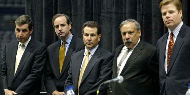 September 16, 2003: Primary owners, from left to right, Steve Belkin, J. Michael Gearon Jr., Bruce Levenson, Ed Peskowitz, and John Rutherford Seydel II, who have acquired the Atlanta Hawks NBA team and the Atlanta Thrashers NHL team, and operating rights to the Philips Arena, listen to a questionduring a press conference in Atlanta. (Reuters)