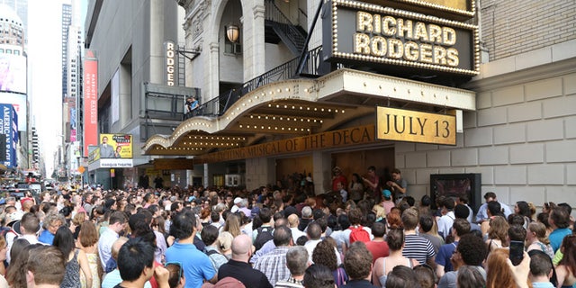 NEW YORK, NY - JULY 13: Huge crowds line up for the Lottery to win $10 front-row seats to see the new Broadway musical Hamilton. The musical about Founding Father Alexander Hamilton, whose face is depicted on the $10 bill, had their first preview at the Richard Rodgers Theatre on July 13, 2015 in New York City. (Photo by Walter McBride/Getty Images)