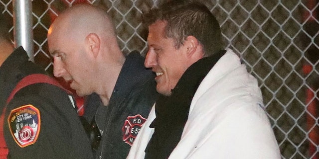 The pilot of the helicopter, Richard Vance, after emerging from the frigid waters of New York City's East River on Sunday night.