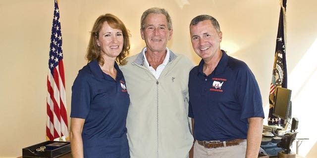 The Richers meet with President George Bush in Texas on a stop during their cross-country bike ride to raise money for the CIA Officers Memorial Foundation.