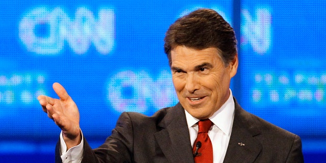 September 12: Republican presidential candidate Texas Gov. Rick Perry gestures during a Republican presidential debate in Tampa, Florida.