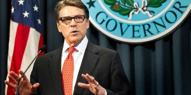 Gov. Rick Perry makes a statement in Austin, Texas on Saturday, Aug. 16, 2014 concerning the indictment on charges of coercion of a public servant and abuse of his official capacity.