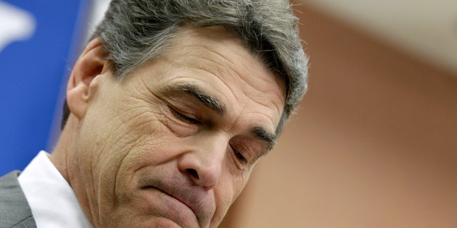 Jan. 19: Republican presidential candidate, Texas Gov. Rick Perry pauses while announcing he is suspending his campaign and endorsing Newt Gingrich, in North Charleston, S.C.