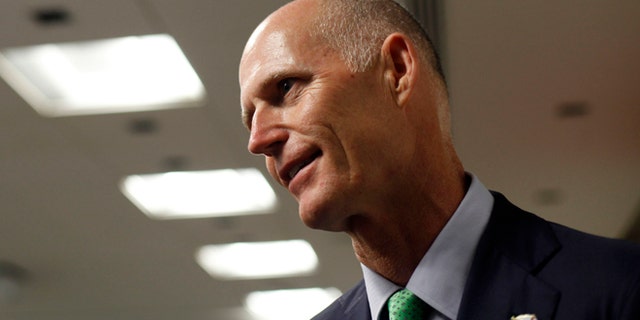 FILE: Florida governor Rick Scott gave out an incorrect phone number to residents concerned about recent meningitis scare