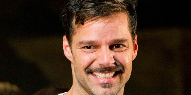 March 12, 2012: Ricky Martin appears at the curtain call after his first performance in the new Broadway production of "Evita", in New York.